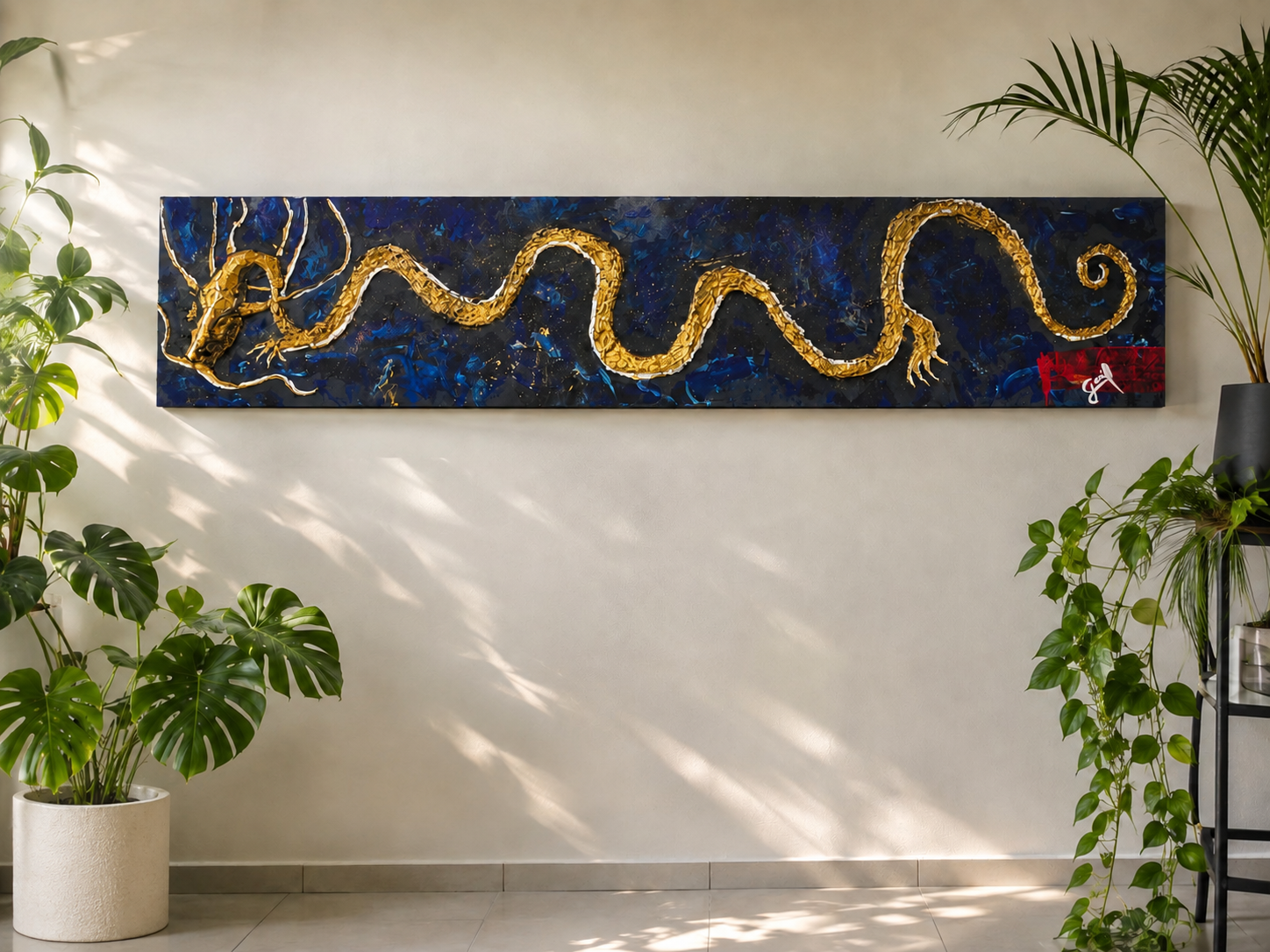 Gold dragon painting by Gail Norman Casas displayed among plants